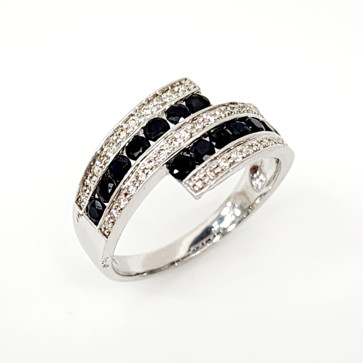 9ct White Gold Crossover Ring with 0.32ct Diamond and Black Sapphire Gold Rings 