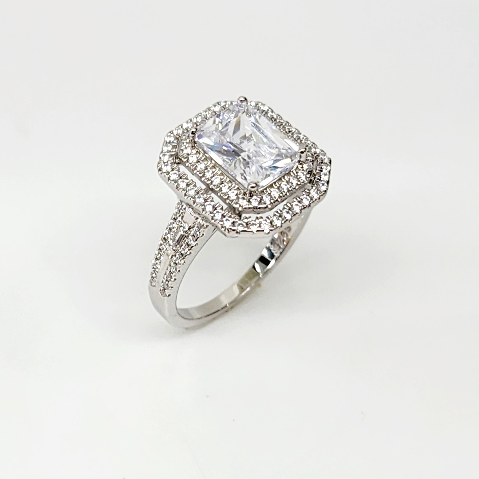 Emerald Cut CZ Engagement Ring with a Double Halo Three Phases Pave Setting in Sterling Silver