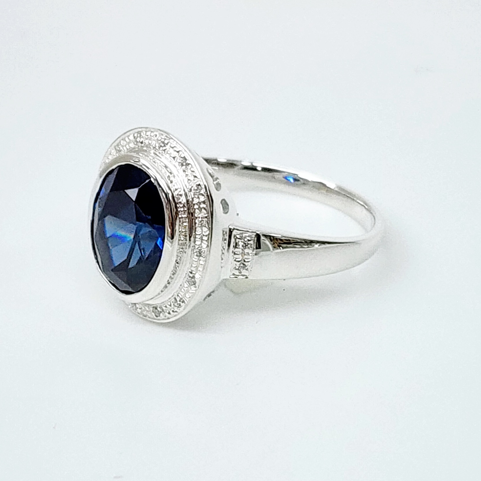 Sterling Silver 10mm x 13mm Ocal Cut Bezel Set Blue CZ and Halo CZ Setting Ladies Dress Ring Gold Rings, Men's Gold Rings 